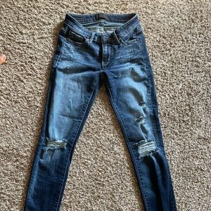 Buckle Black Mid-Rise Skinny Jeans